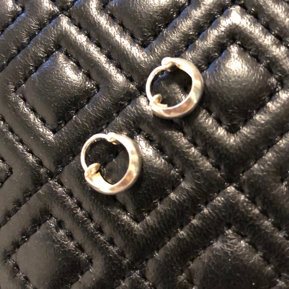 Silver hoop earrings.